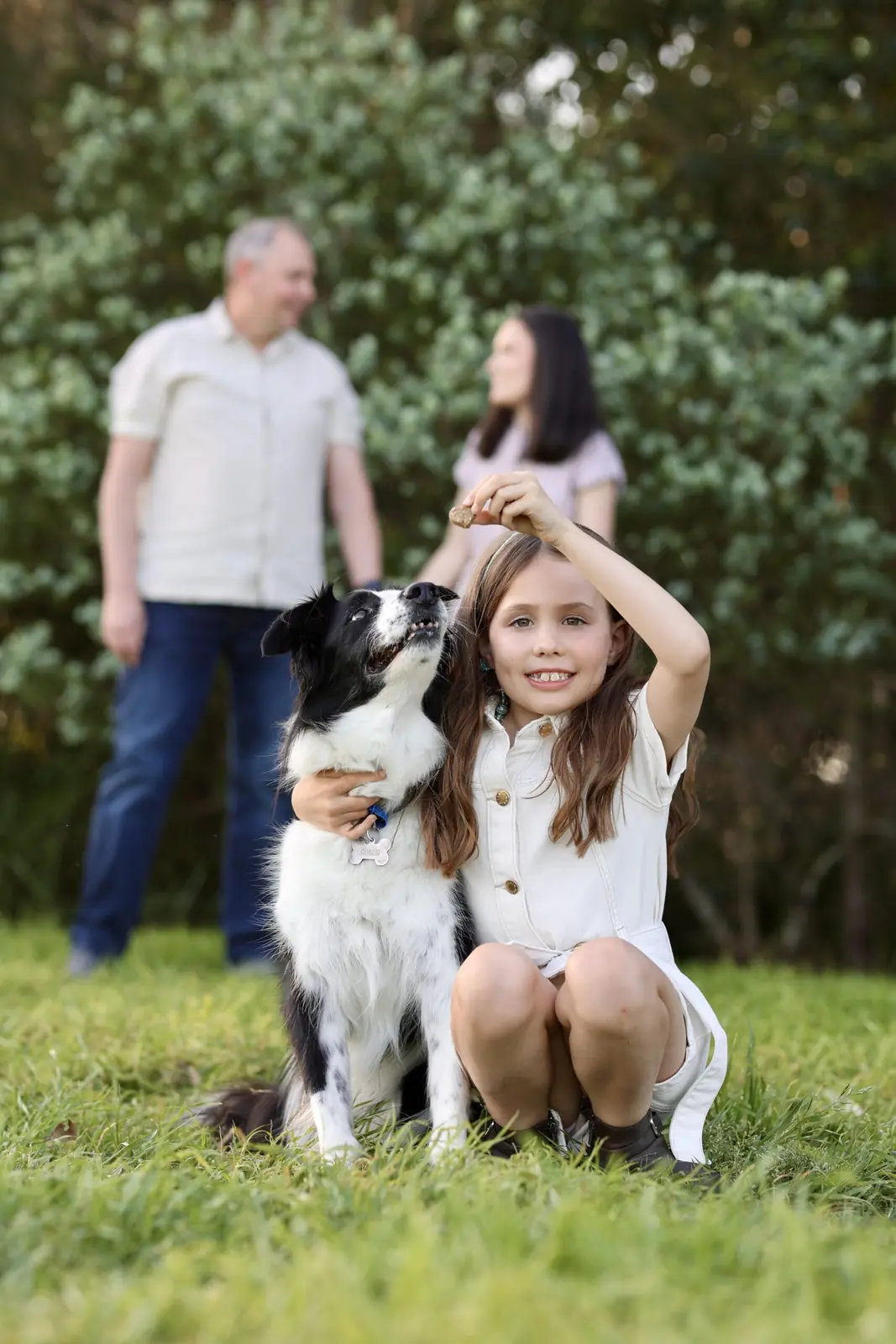Girl hugging her dog